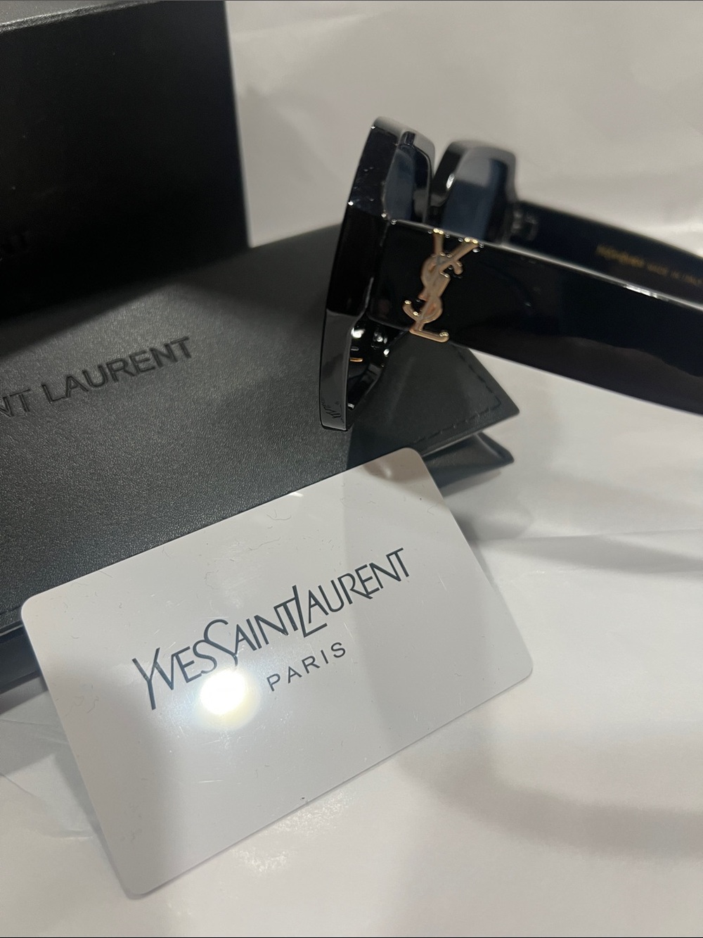 Yves Saint Laurent Glossy Black Sunglasses with Gold YSL Accent